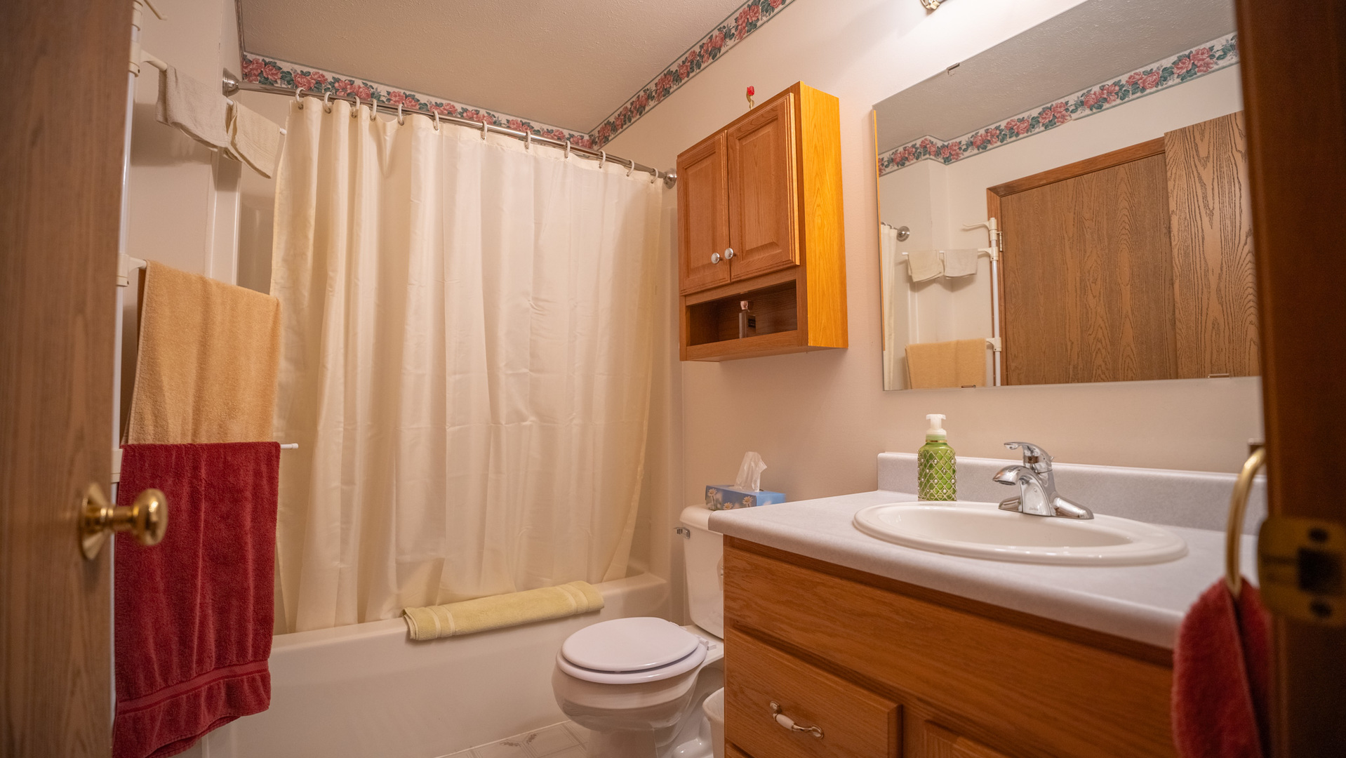 8752 Perryville Road Monroe Center, IL 61052 - Photo 34 of 41 a bathroom with a sink a toilet and shower curtain