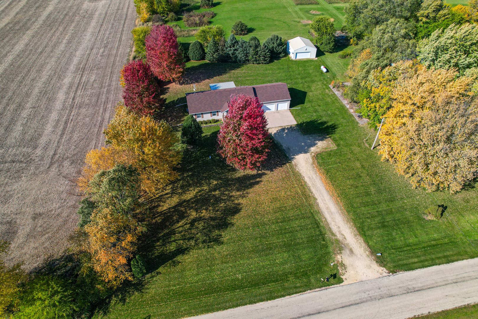 8752 Perryville Road Monroe Center, IL 61052 - Photo 4 of 41 an aerial view of a house