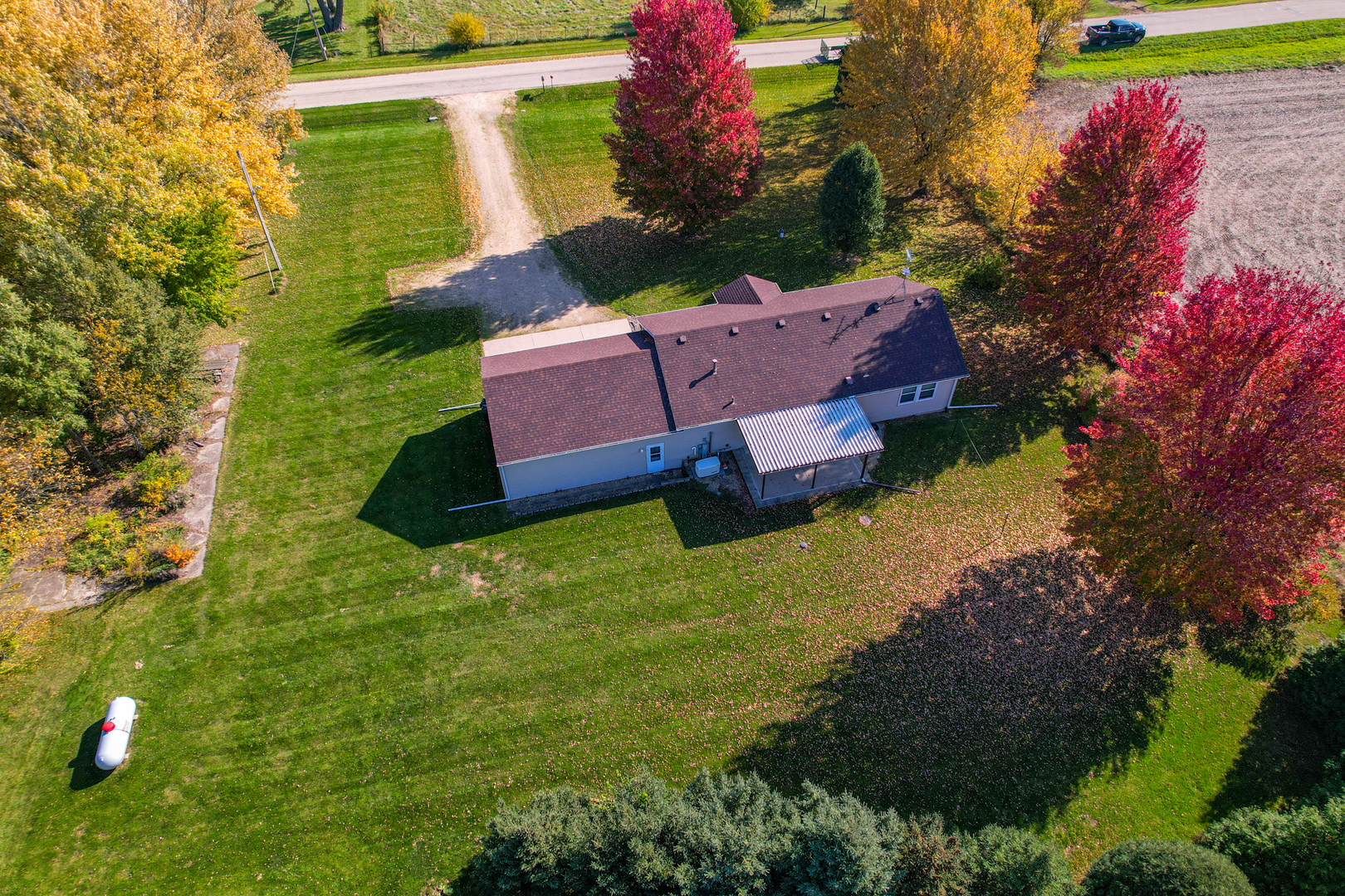 8752 Perryville Road Monroe Center, IL 61052 - Photo 7 of 41 a aerial view of a house with garden space and street view