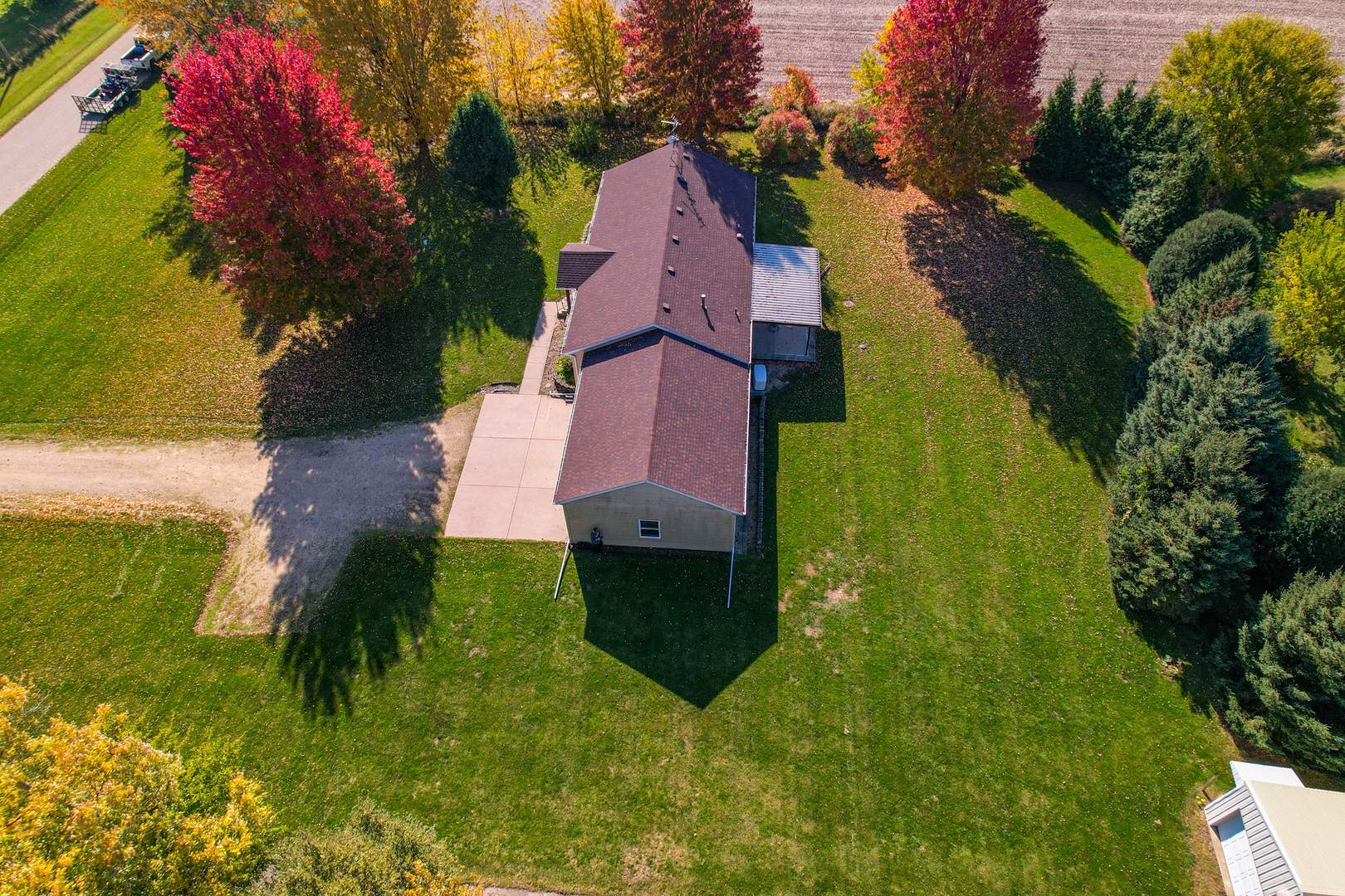 8752 Perryville Road Monroe Center, IL 61052 - Photo 9 of 41 an aerial view of houses with yard