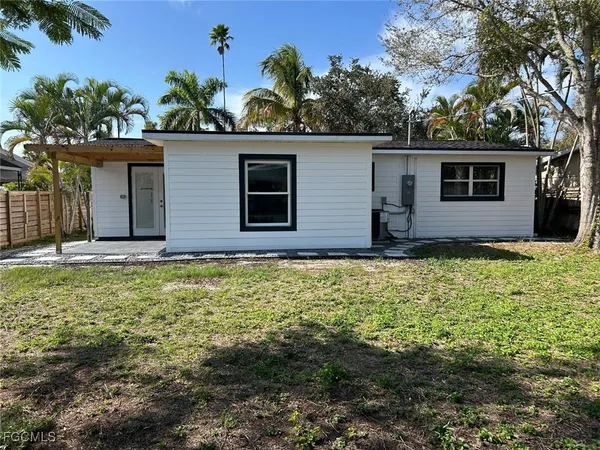 a front view of house with yard