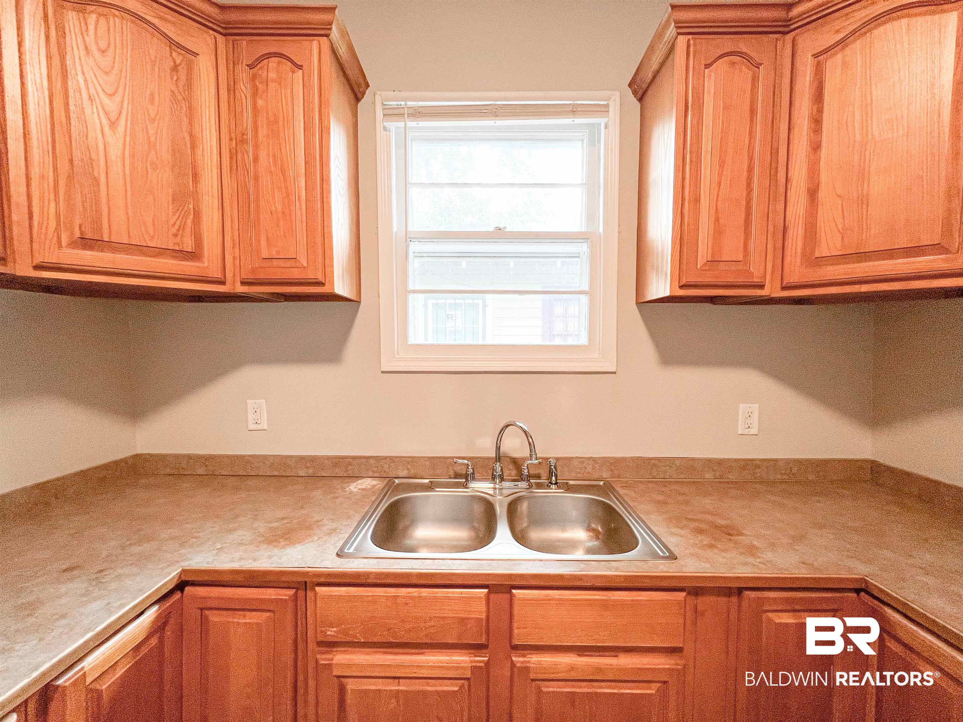 1164 Seneca Street Mobile, AL 36605 - Photo 10 of 22 Kitchen featuring light countertops and a sink