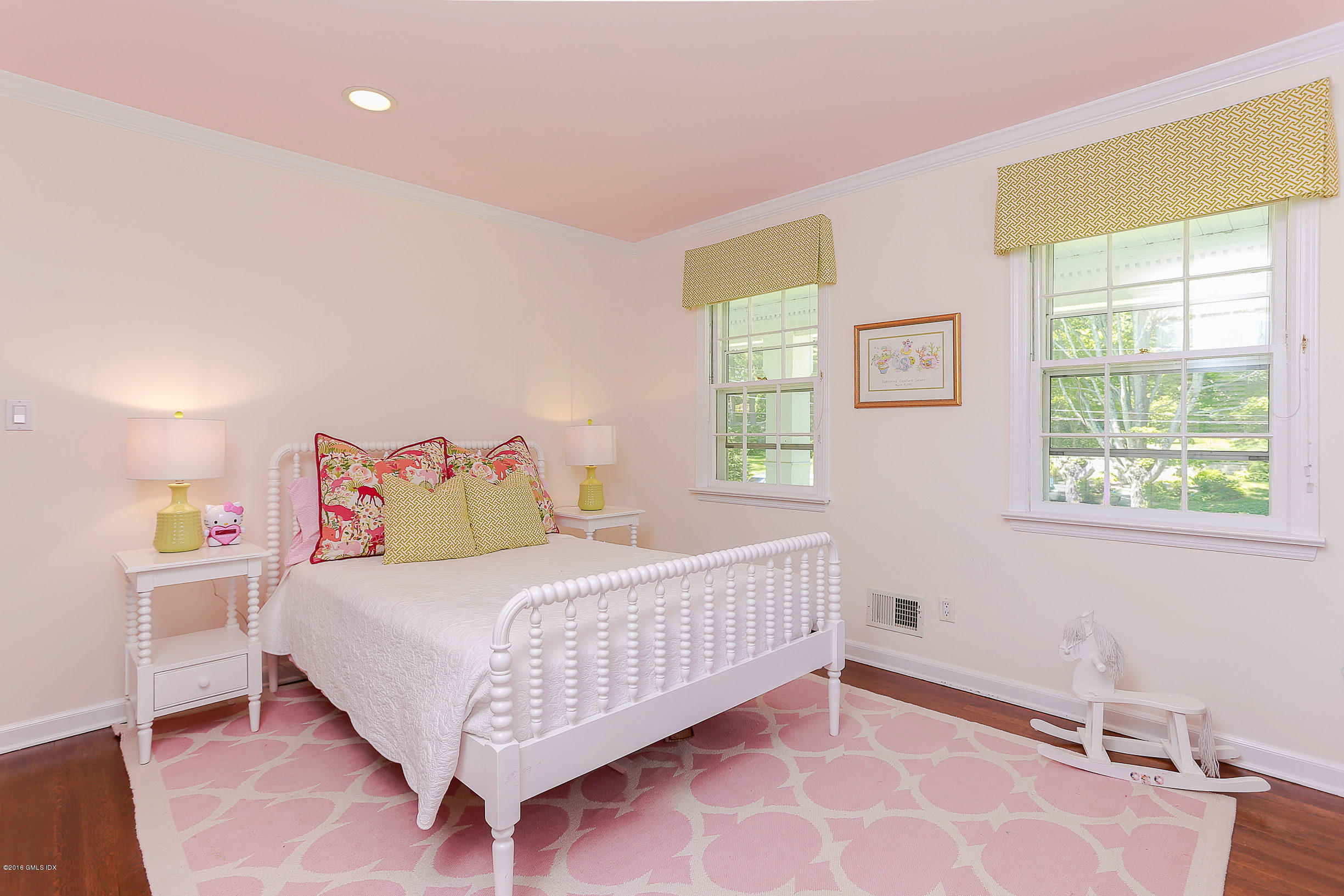 18 Dingletown Road Greenwich, CT 06830 - Photo 11 of 21 a bedroom with a bed and window