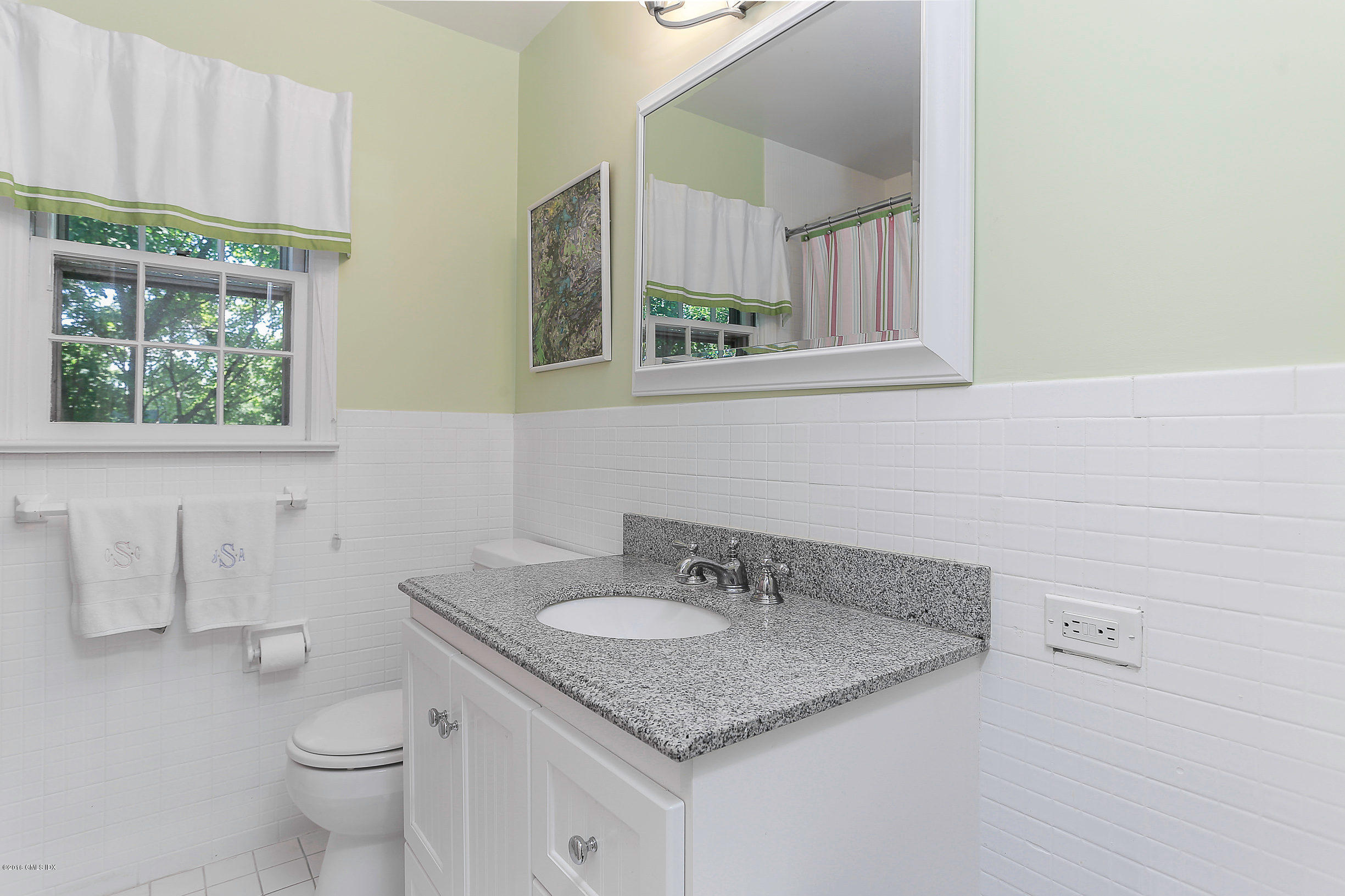 18 Dingletown Road Greenwich, CT 06830 - Photo 13 of 21 a bathroom with a granite countertop sink and a toilet