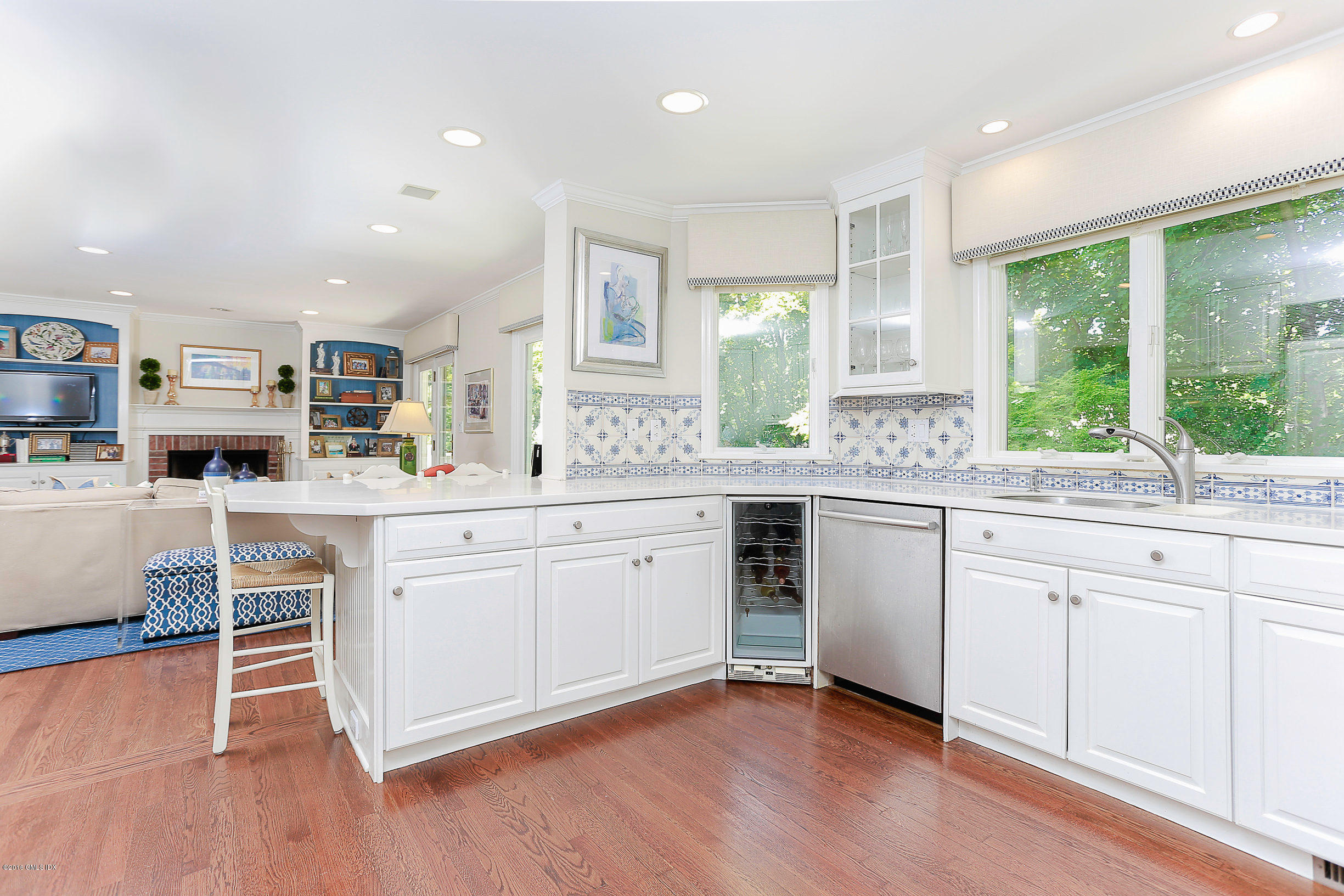 18 Dingletown Road Greenwich, CT 06830 - Photo 3 of 21 a kitchen with granite countertop white cabinets and white appliances