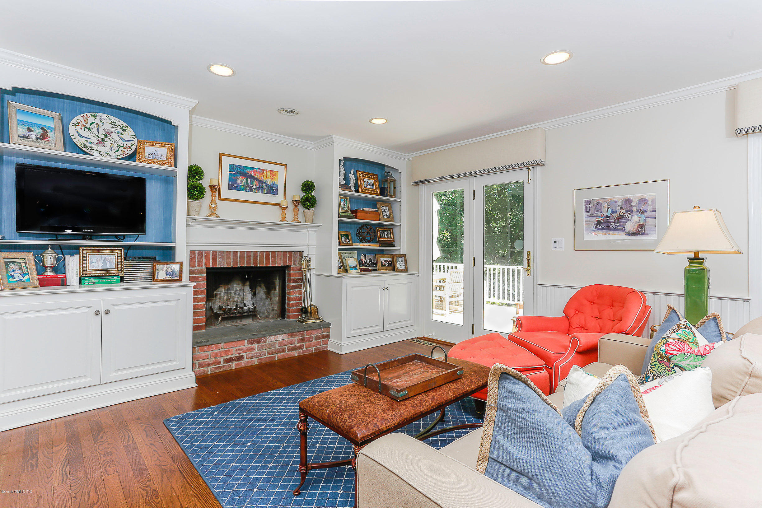 18 Dingletown Road Greenwich, CT 06830 - Photo 6 of 21 a living room with furniture and a flat screen tv