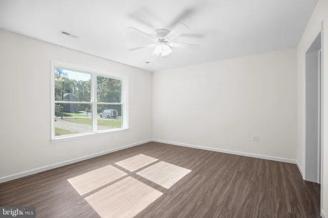 a bathroom with a sink a toilet and a bathtub