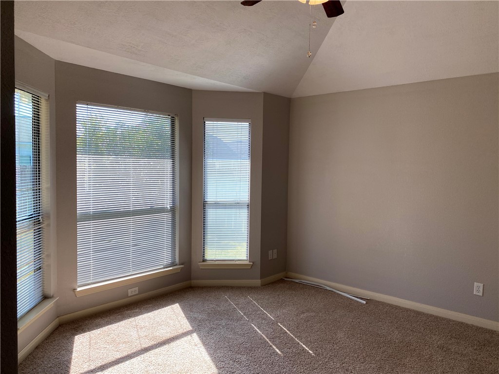 2018 Snowy Brook Trail Bryan, TX 77807 - Photo 4 of 9 a view of an empty room with a window
