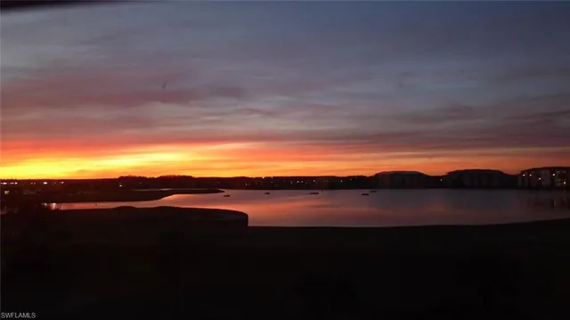 a view of lake and mountain