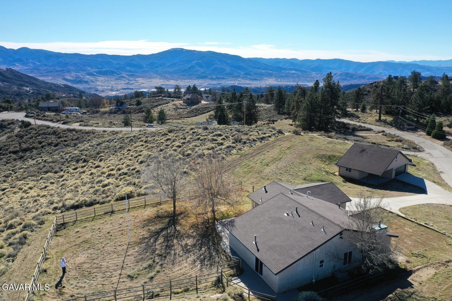 26801 Cabriolet Court Tehachapi, CA 93561 - Photo 59 of 60 a view of a backyard with mountain view