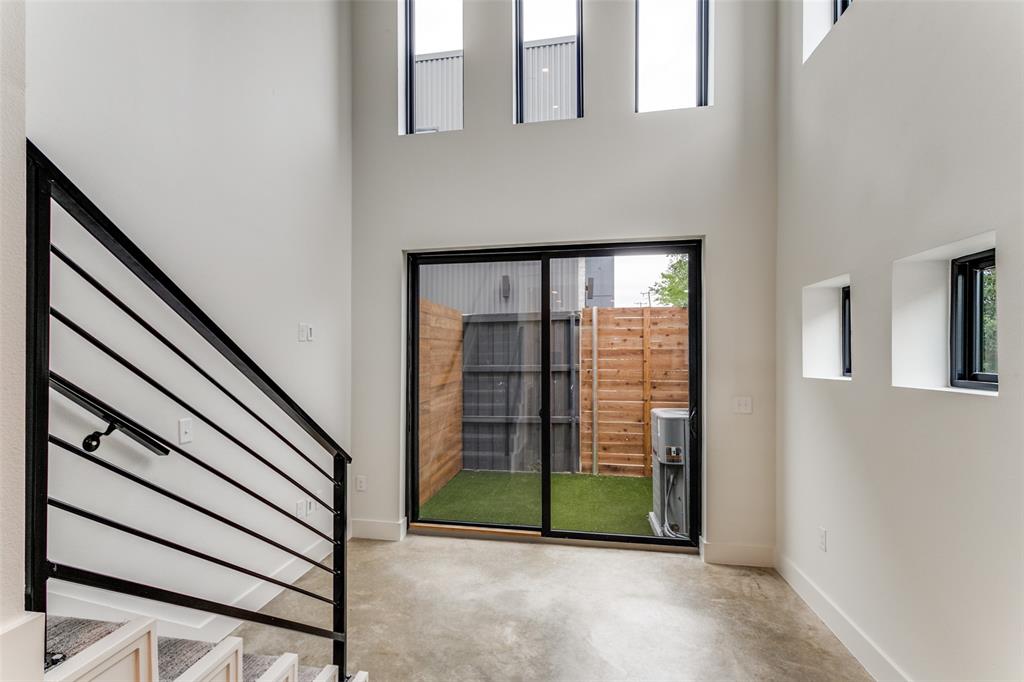 4715 Live Oak Street, Unit 102 Dallas, TX 75204 - Photo 10 of 18 a view of a room with staircase
