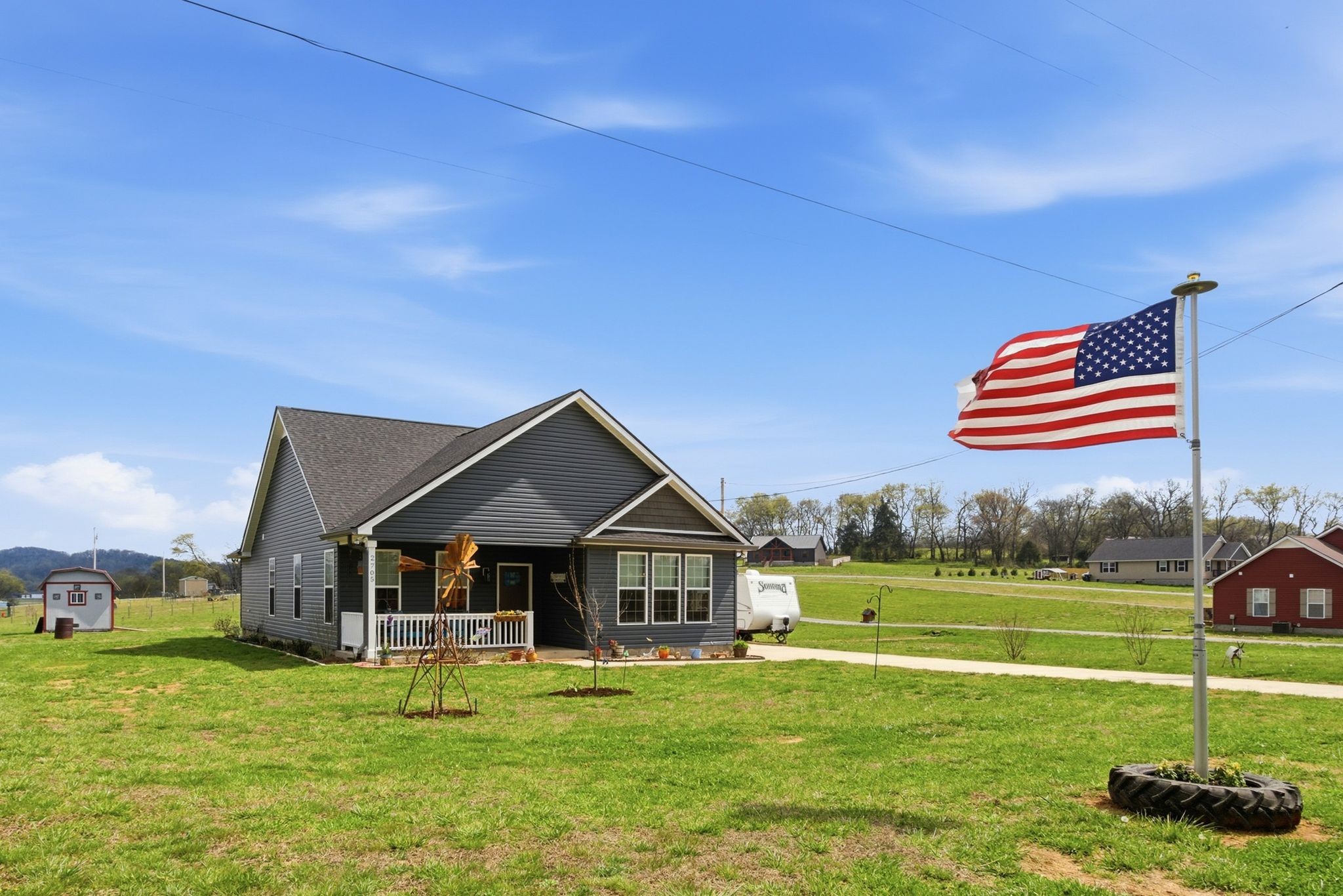 2705 Mc Connell Road Cornersville, TN 37047 - Photo 9 of 41 a front view of a house with a yard