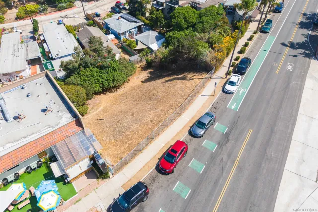 an aerial view of a house an outdoor space