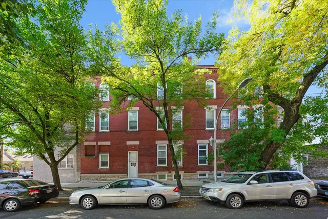 a car parked in front of a house
