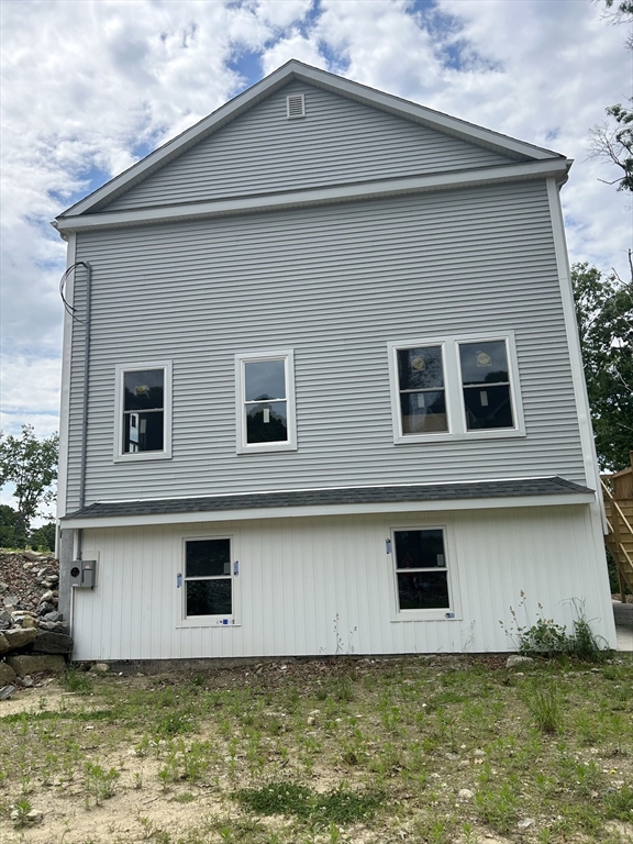 32 Brookside Avenue Webster, MA 01570 - Photo 6 of 12 a front view of a house with pool