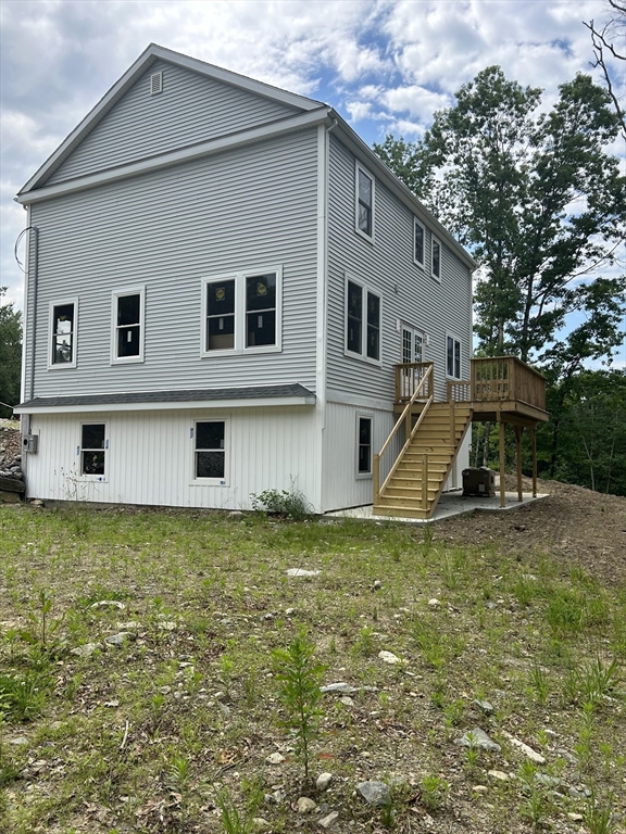 32 Brookside Avenue Webster, MA 01570 - Photo 7 of 12 a view of a house with roof deck