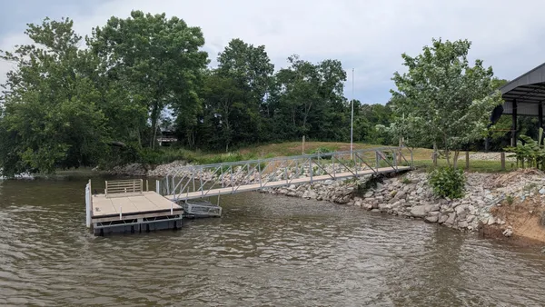 a view of a lake with a yard
