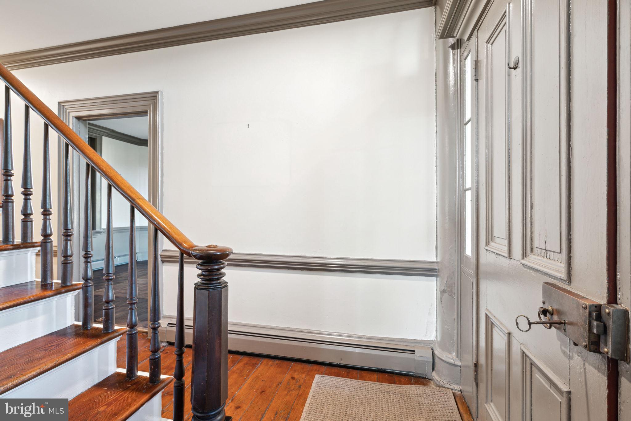 162 Sheehan Road Avondale, PA 19311 - Photo 4 of 83 a view of staircase with wooden floor and white walls
