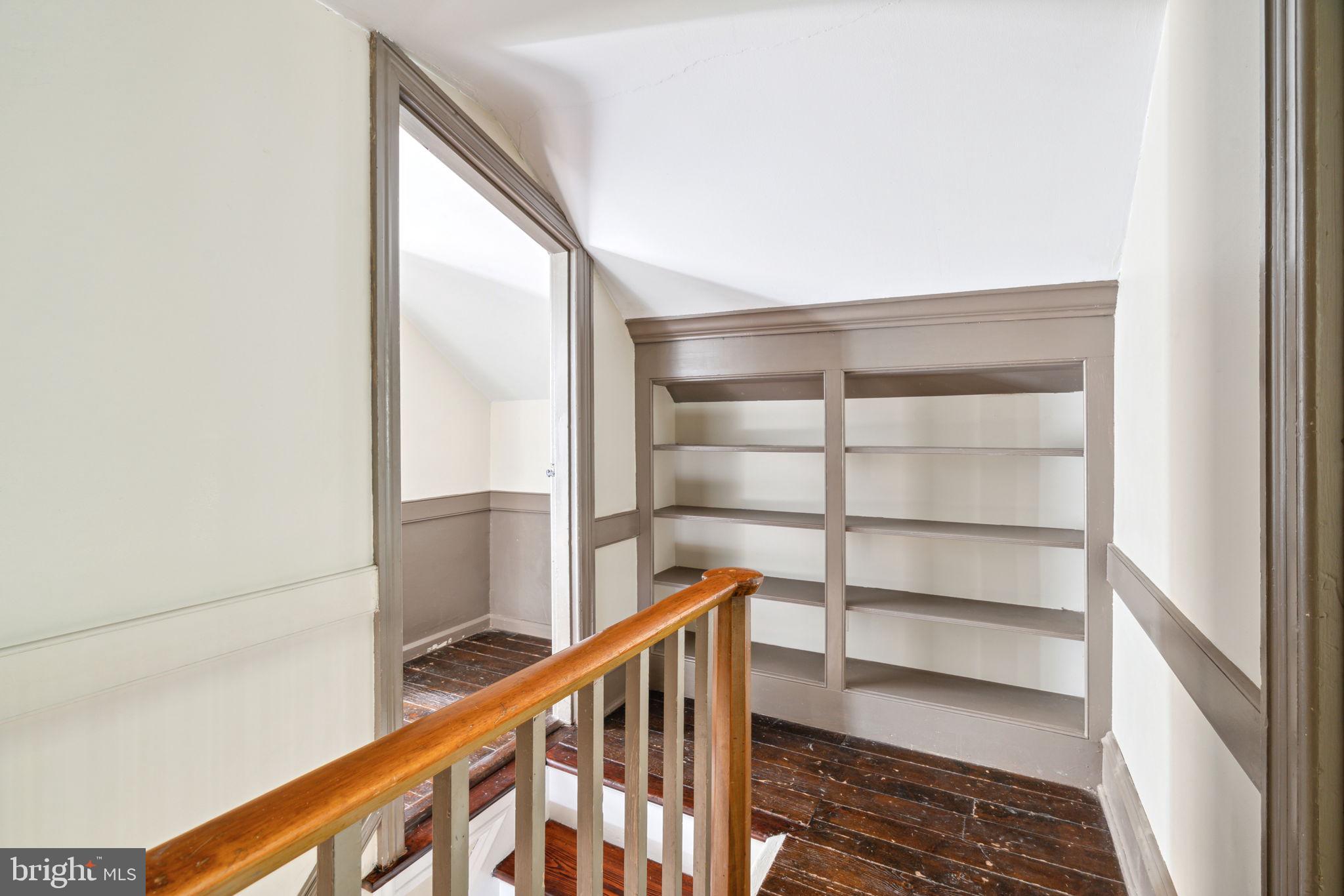 162 Sheehan Road Avondale, PA 19311 - Photo 45 of 83 a view of a hallway with wooden floor and staircase