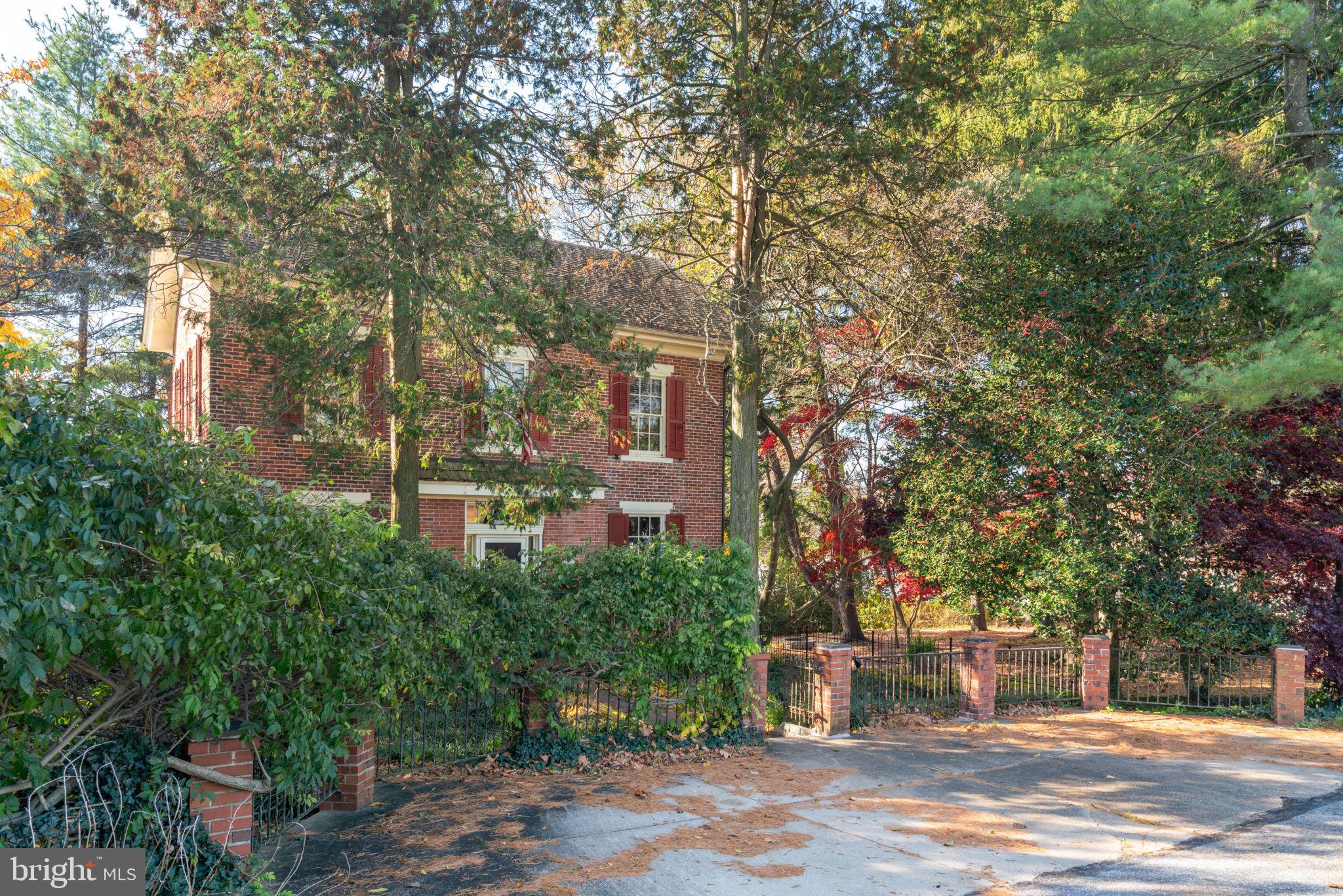 162 Sheehan Road Avondale, PA 19311 - Photo 83 of 83 a tall building with trees in front of it