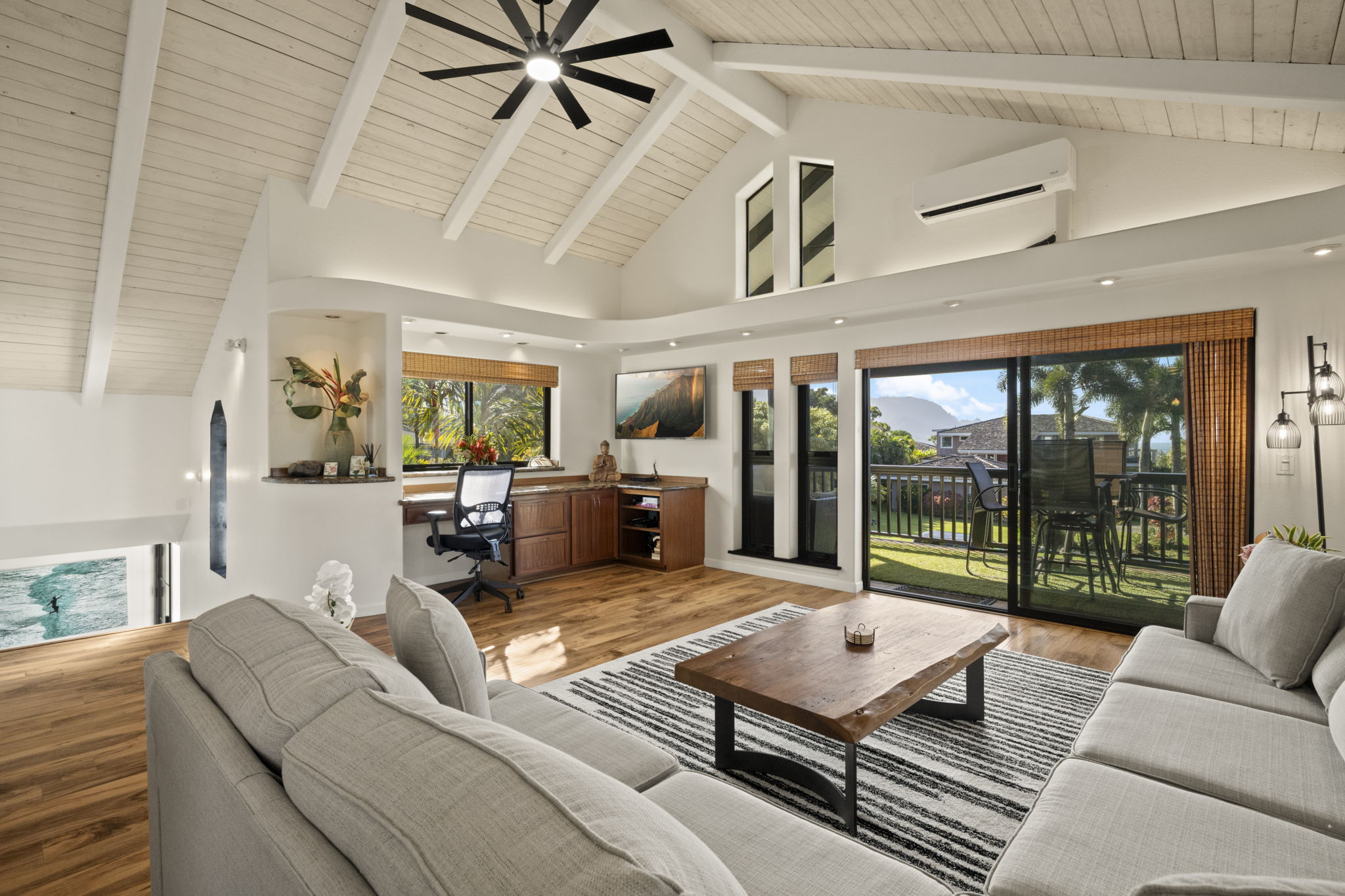 3835 Punahele Road Princeville, HI 96722 - Photo 2 of 30 a living room with furniture ceiling fan and a rug