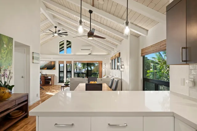 a view of a living room and kitchen floor