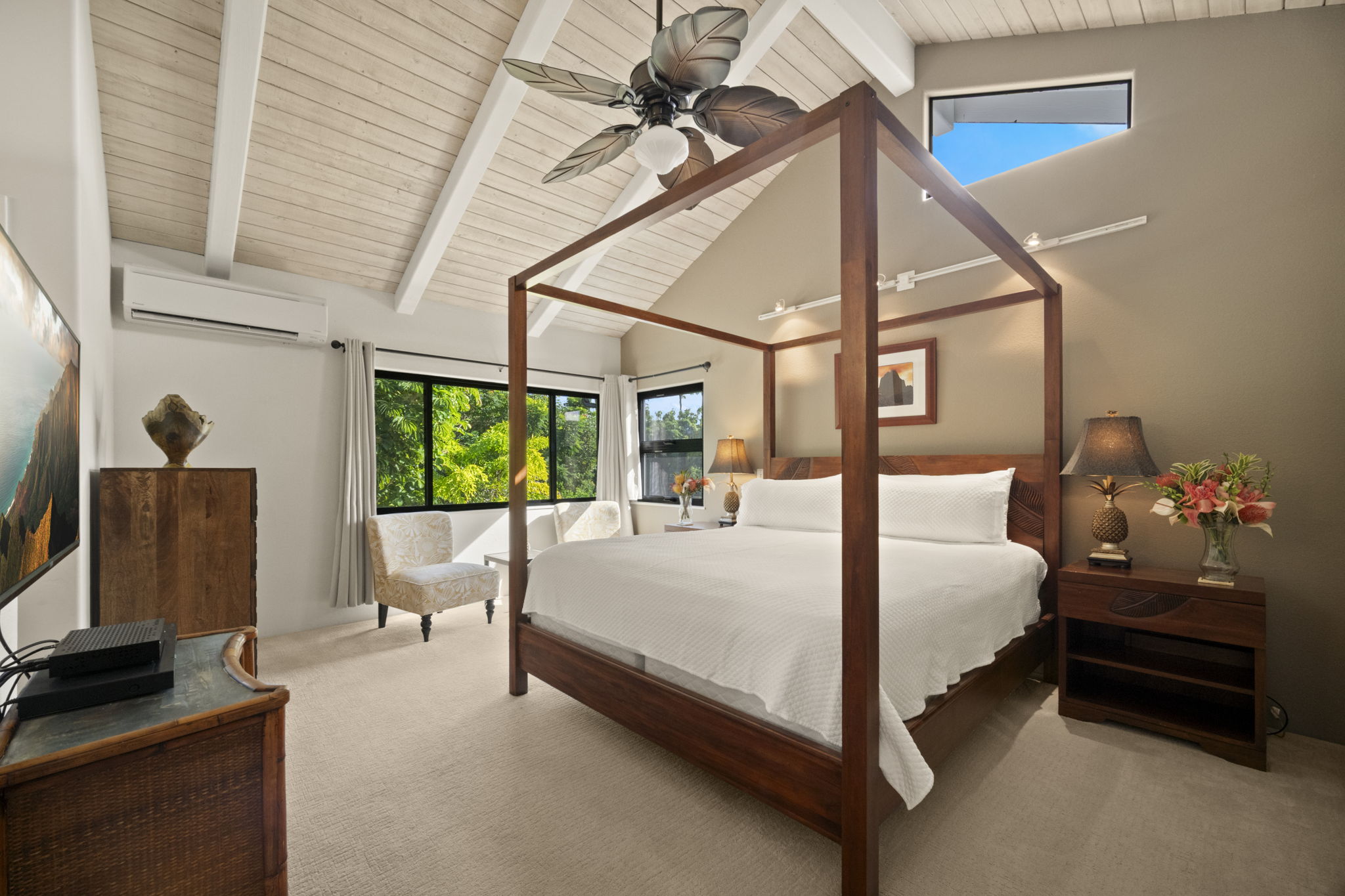 3835 Punahele Road Princeville, HI 96722 - Photo 10 of 30 a bedroom with a bed and large windows