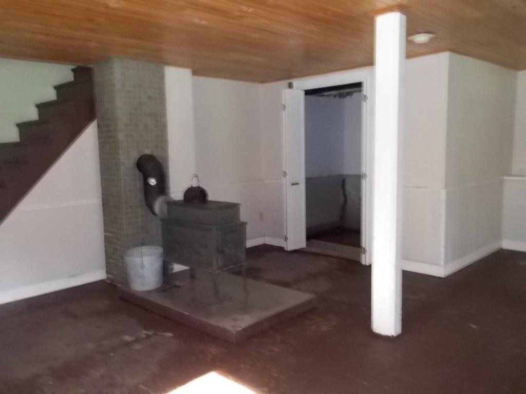 28 Upper Spruce Shore Road Harpswell, ME 04079 - Photo 12 of 21 Basement wood stove.
