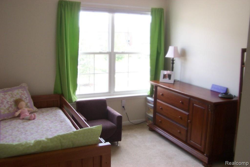 4257 Hampton Ridge Boulevard, Unit 132 Howell, MI 48843 - Photo 13 of 22 2nd bedroom 1