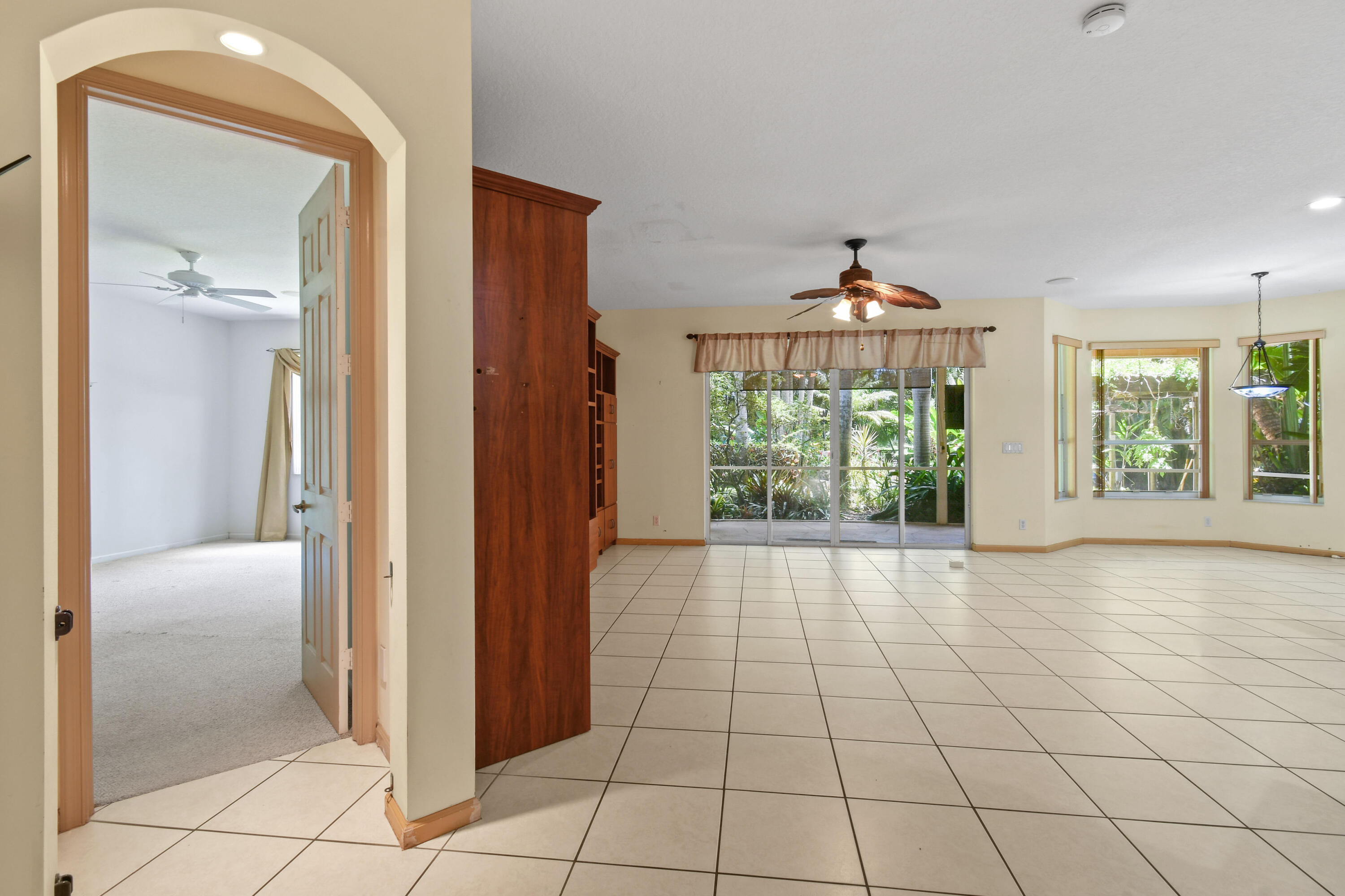 575 Scrubjay Lane Jupiter, FL 33458 - Photo 16 of 60 an empty room with windows and closet