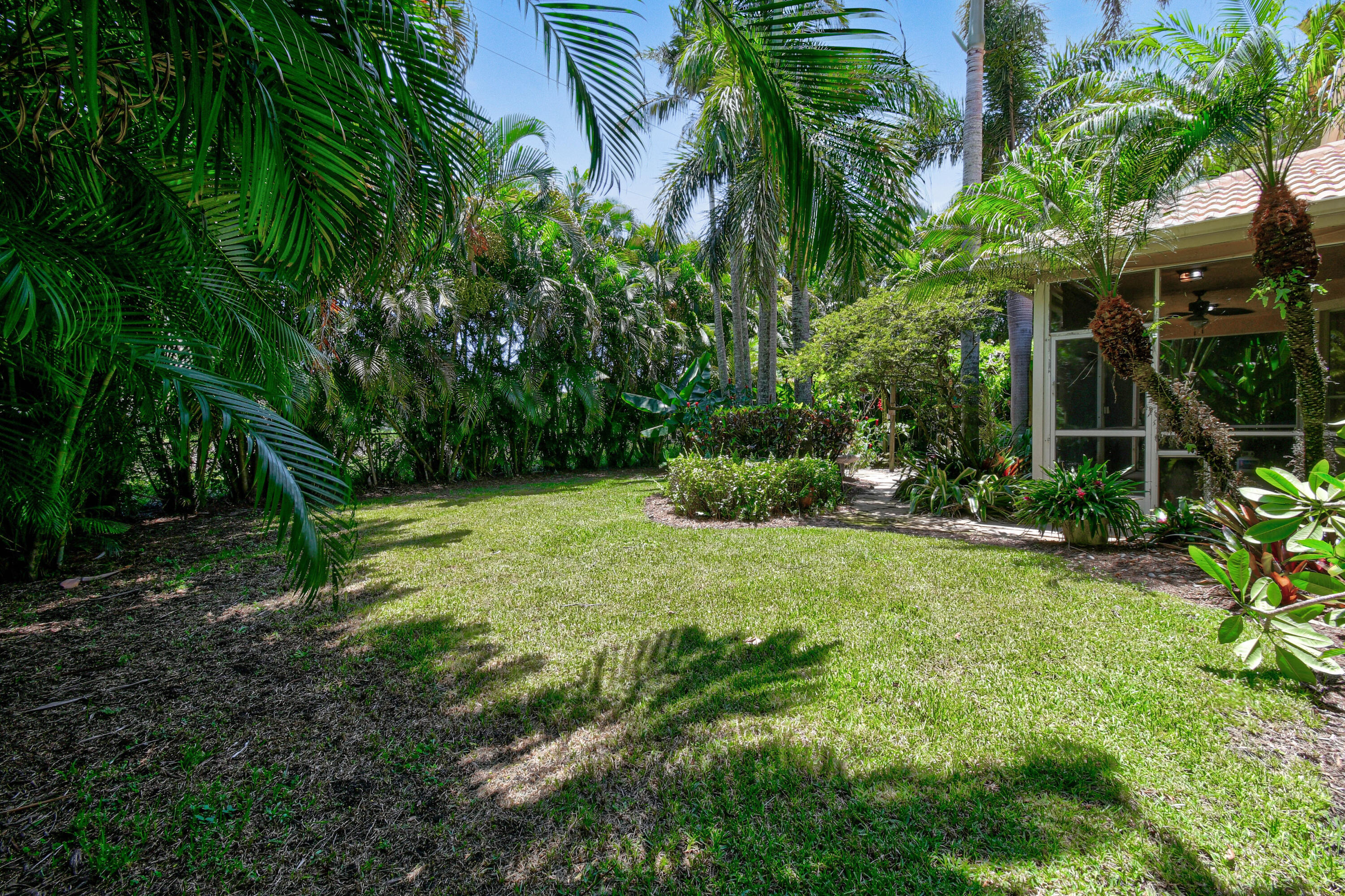 575 Scrubjay Lane Jupiter, FL 33458 - Photo 42 of 60 a view of backyard with green space