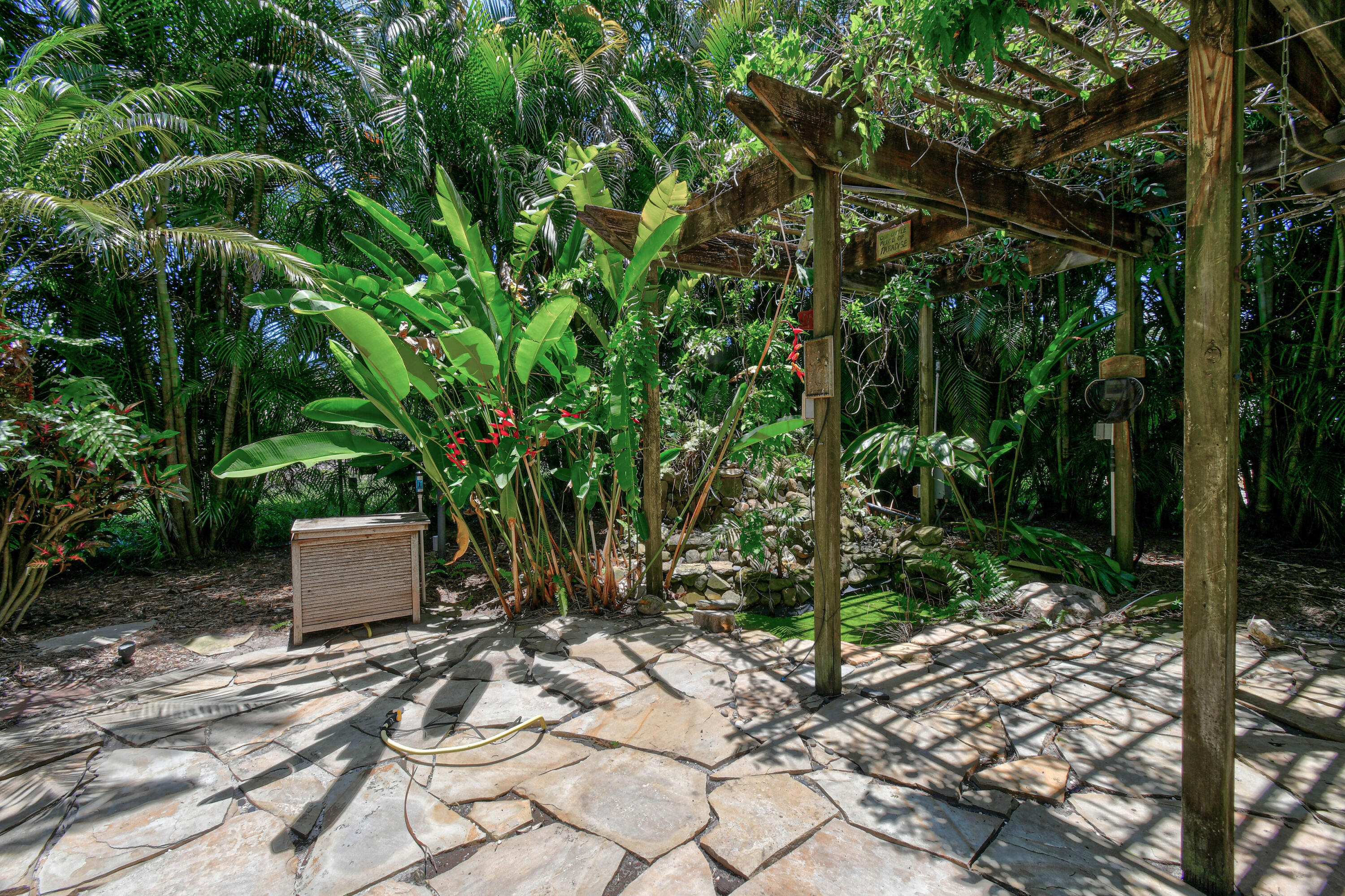 575 Scrubjay Lane Jupiter, FL 33458 - Photo 48 of 60 a view of a room with a tree