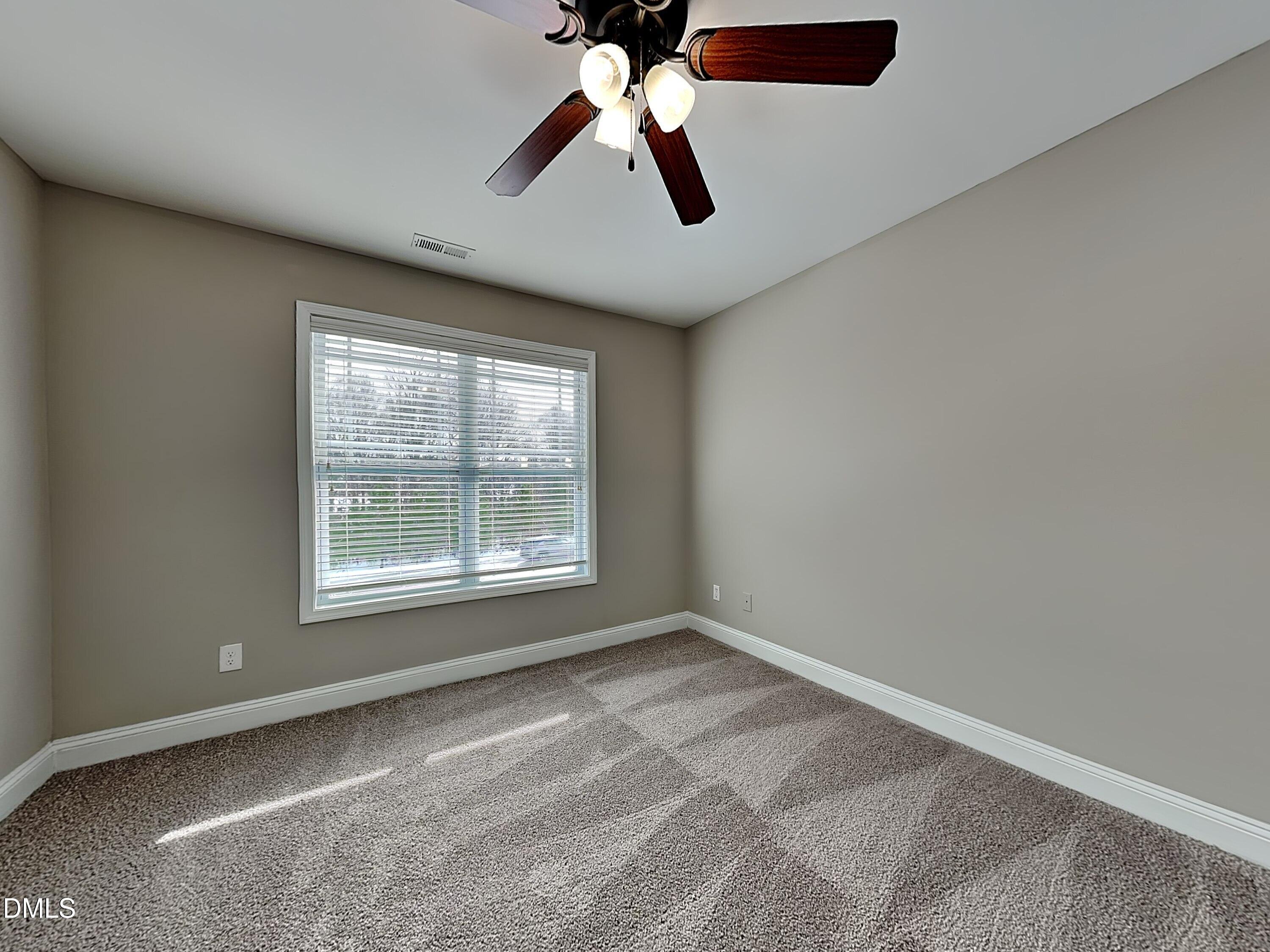 161 Summit Overlook Drive Clayton, NC 27527 - Photo 15 of 25 wooden floor in an empty room with a window