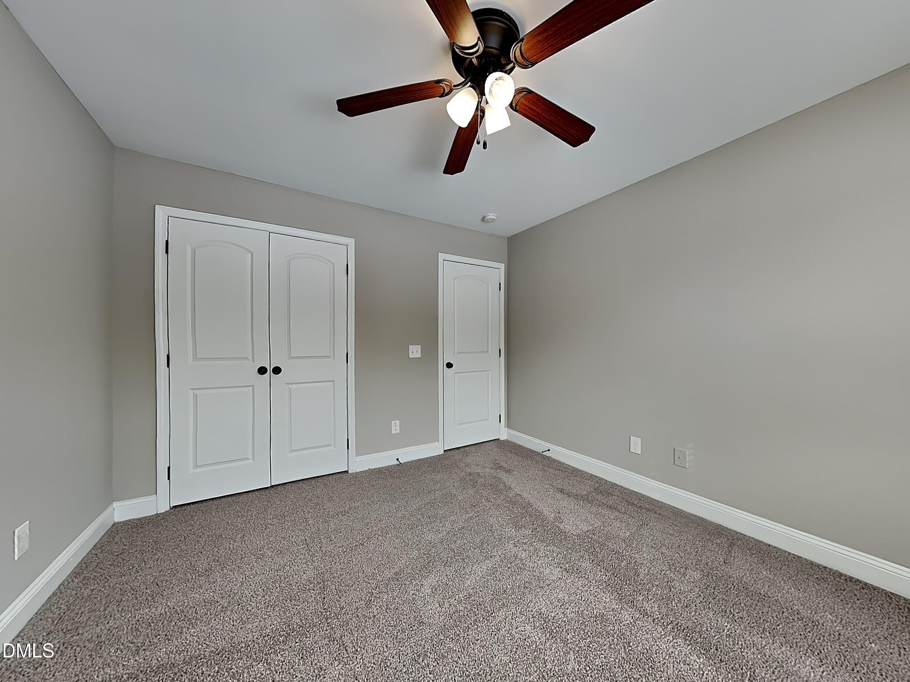 161 Summit Overlook Drive Clayton, NC 27527 - Photo 16 of 25 a view of an empty room
