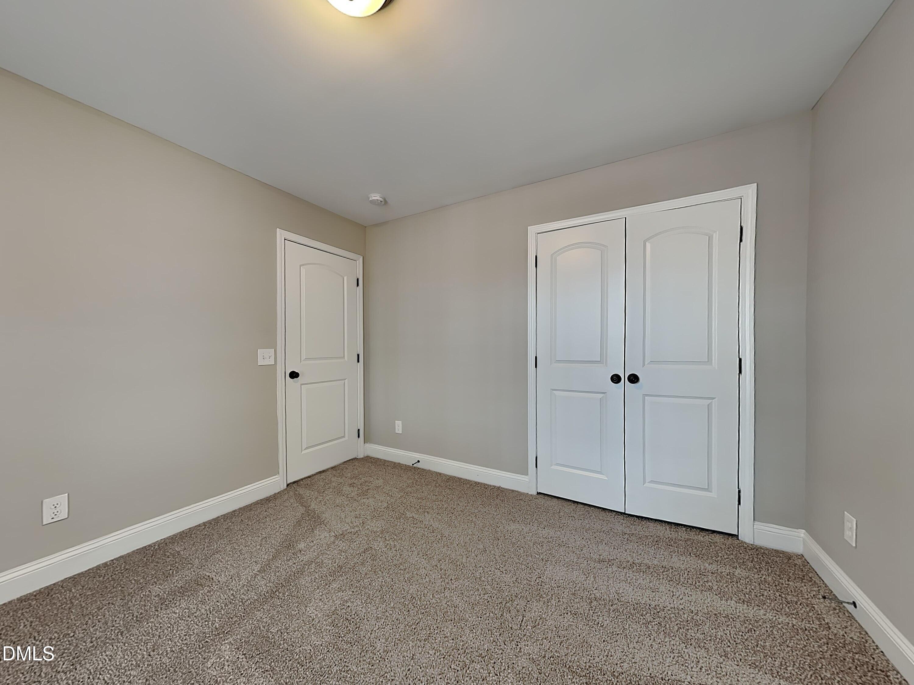 161 Summit Overlook Drive Clayton, NC 27527 - Photo 17 of 25 a view of an empty room