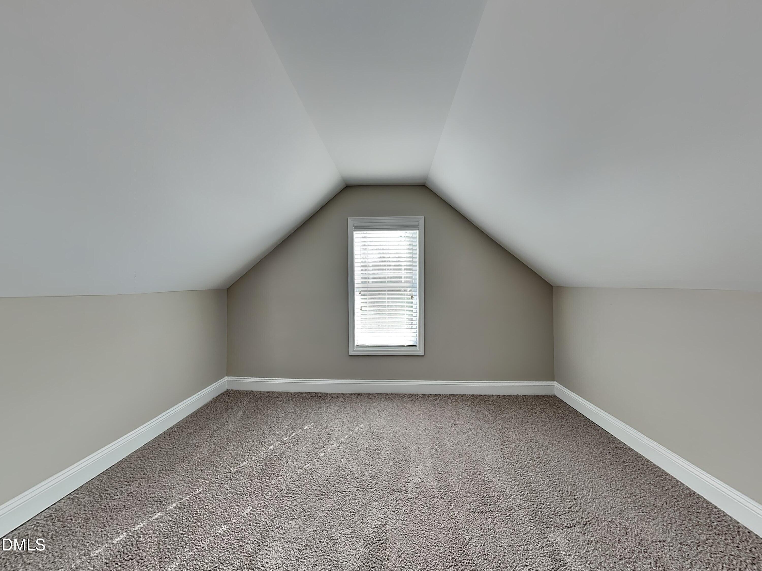 161 Summit Overlook Drive Clayton, NC 27527 - Photo 20 of 25 an empty room with a window