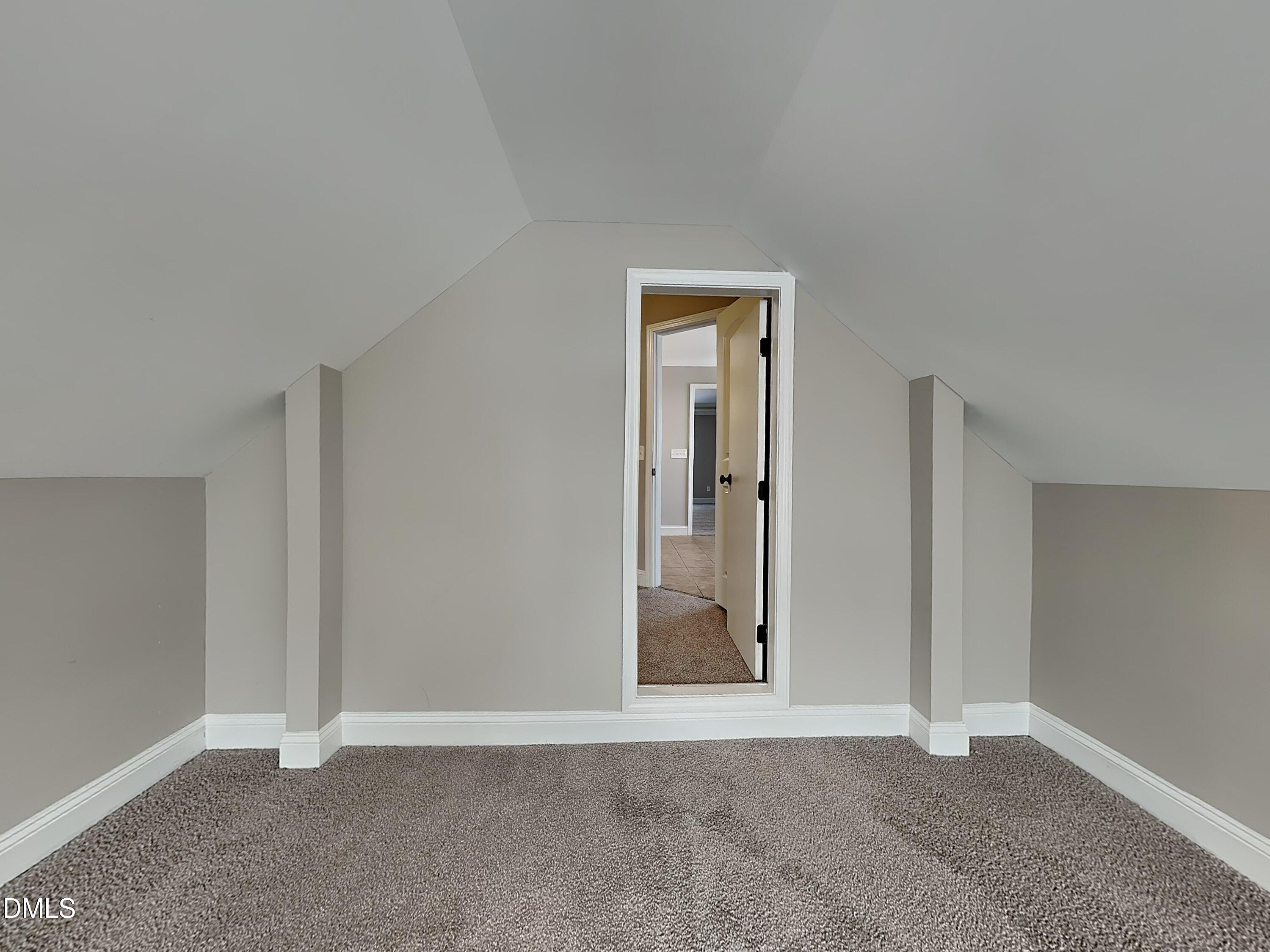 161 Summit Overlook Drive Clayton, NC 27527 - Photo 21 of 25 an empty room with closet