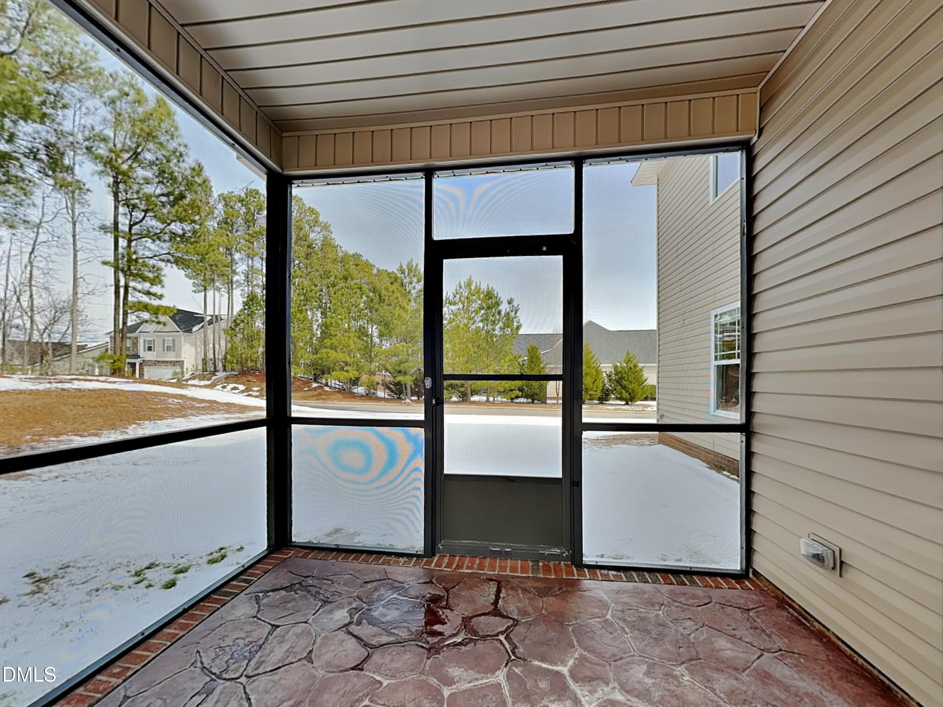 161 Summit Overlook Drive Clayton, NC 27527 - Photo 22 of 25 a view of a large window with an outdoor space