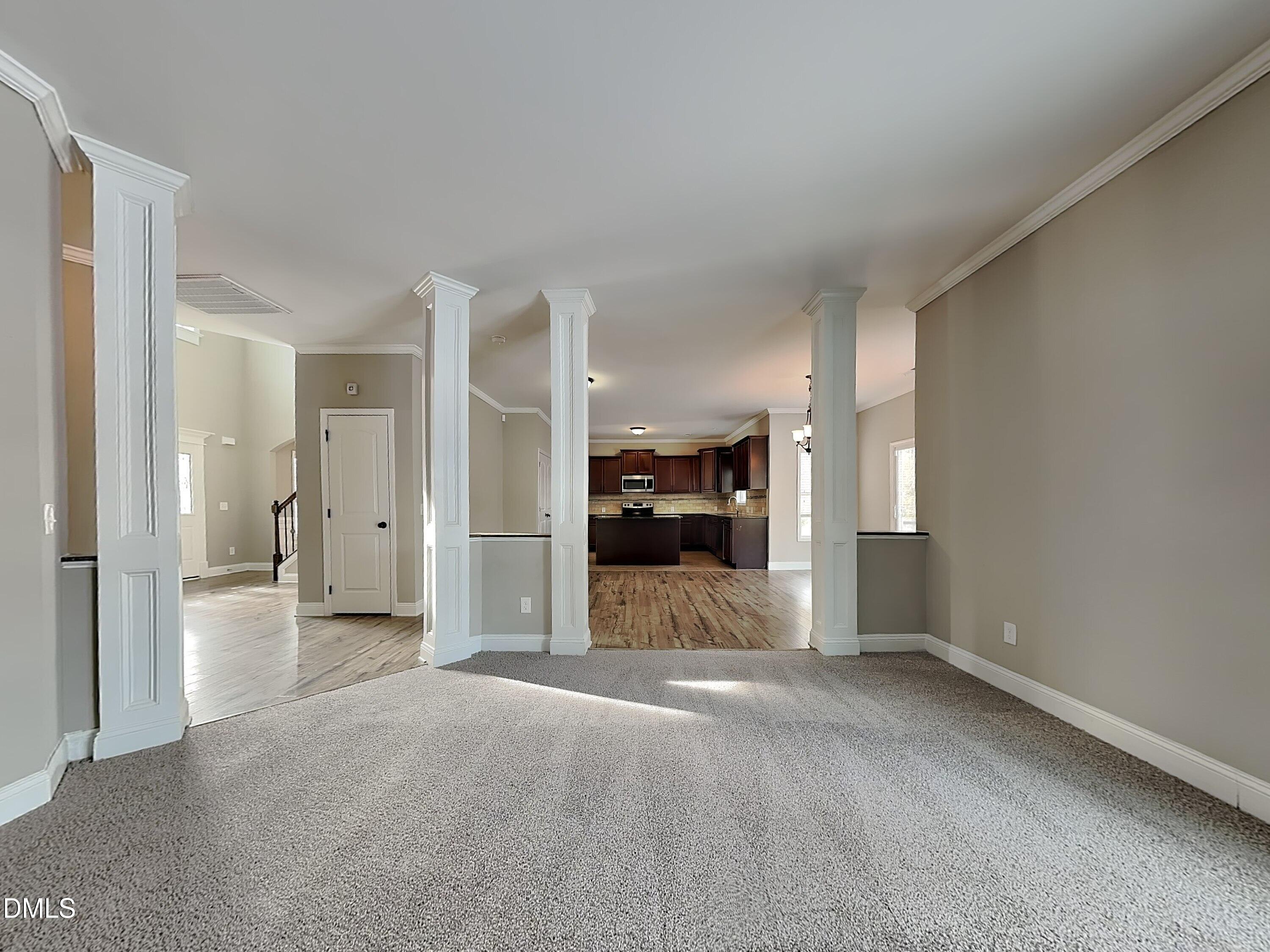 161 Summit Overlook Drive Clayton, NC 27527 - Photo 7 of 25 a view of a livingroom with a kitchen