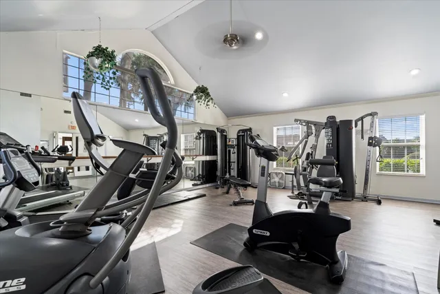 a kitchen with a sink cabinets a counter top space and stainless steel appliances