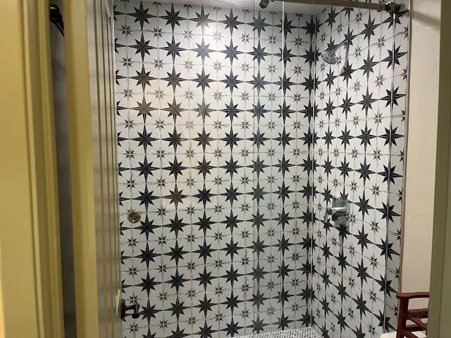 a bathroom with a shower curtain
