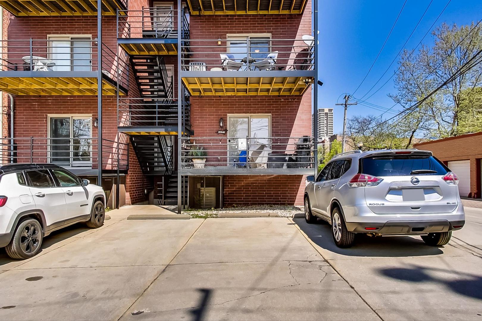 1033 West Taylor Street, Unit 2E Chicago, IL 60607 - Photo 19 of 20 a car parked in front of a building