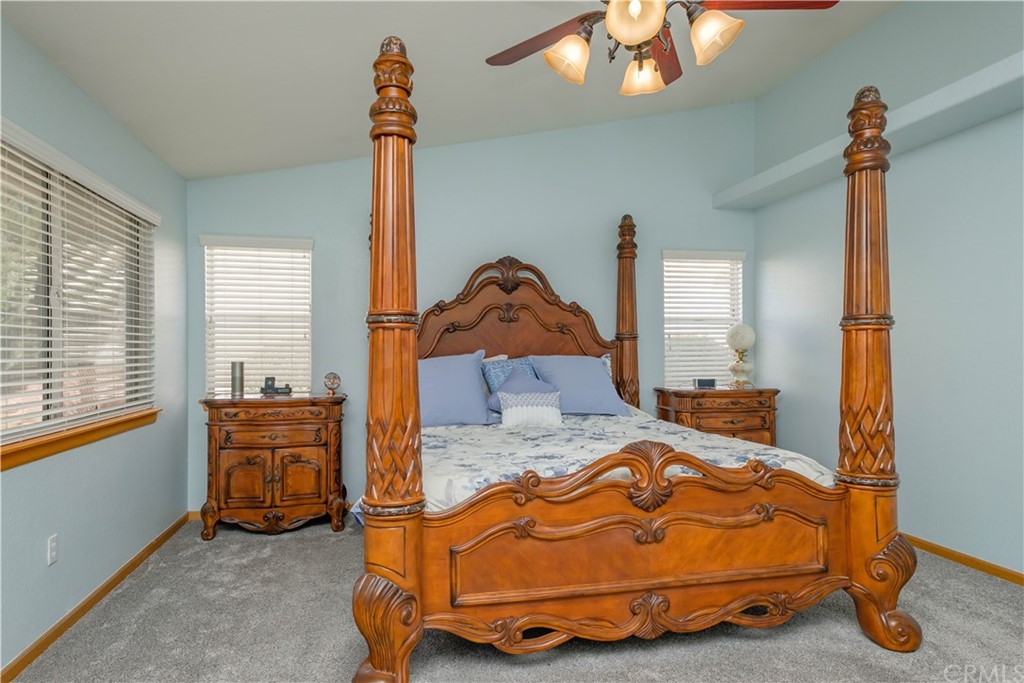 16196 Ridge View Drive Apple Valley, CA 92307 - Photo 35 of 68 a bedroom with bed and window