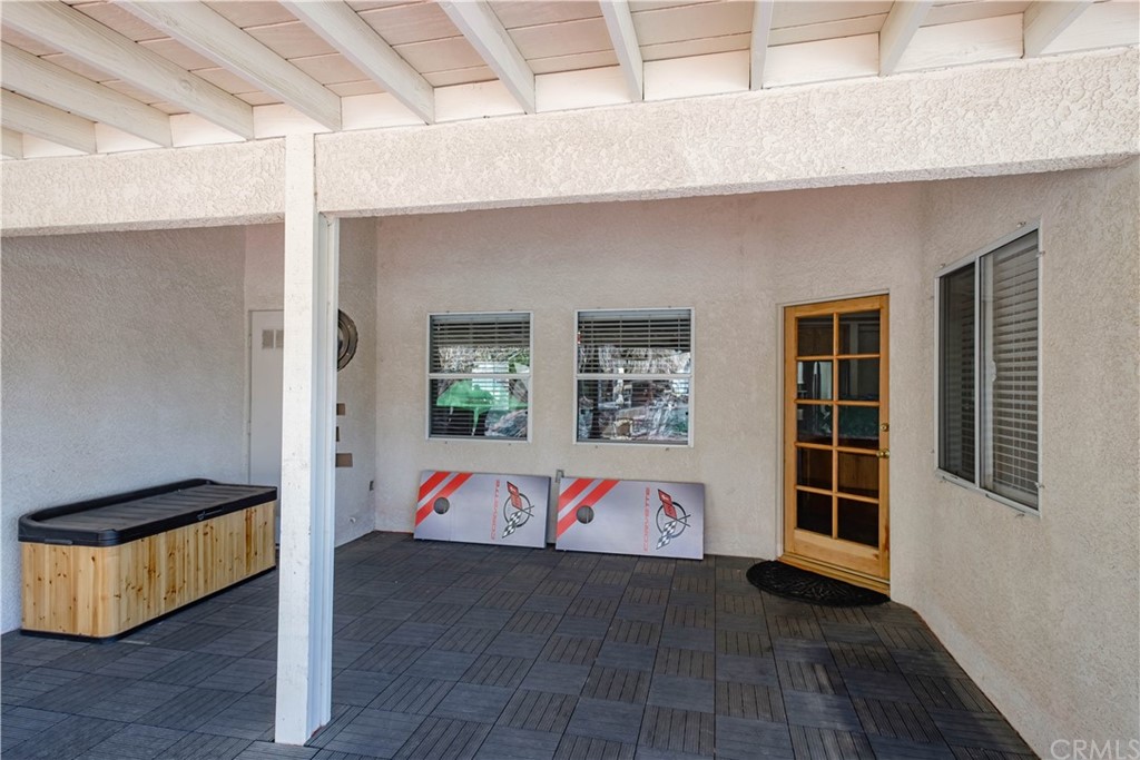 16196 Ridge View Drive Apple Valley, CA 92307 - Photo 43 of 68 an entryway with wooden floor and furniture
