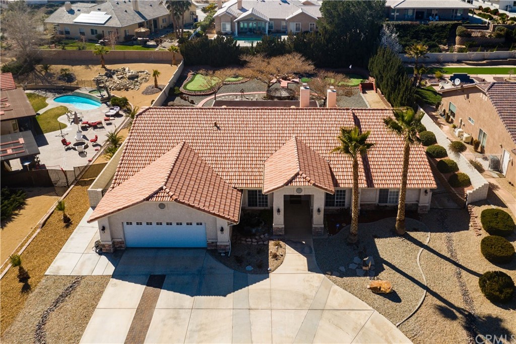 16196 Ridge View Drive Apple Valley, CA 92307 - Photo 61 of 68 an aerial view of a house with a garden