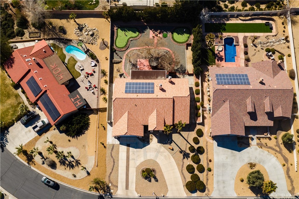 16196 Ridge View Drive Apple Valley, CA 92307 - Photo 63 of 68 an aerial view of a house with a yard and furniture