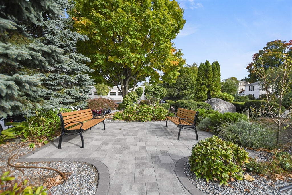 431 Place Lane, Unit 431 Woburn, MA 01801 - Photo 37 of 38 a backyard of a house with outdoor seating