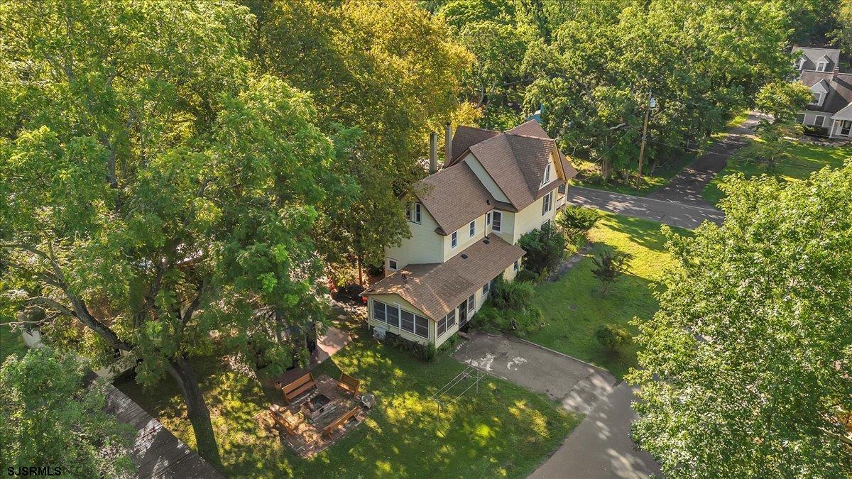 56 Main Street Port Republic, NJ 08241 - Photo 8 of 44 a view of a house with a yard