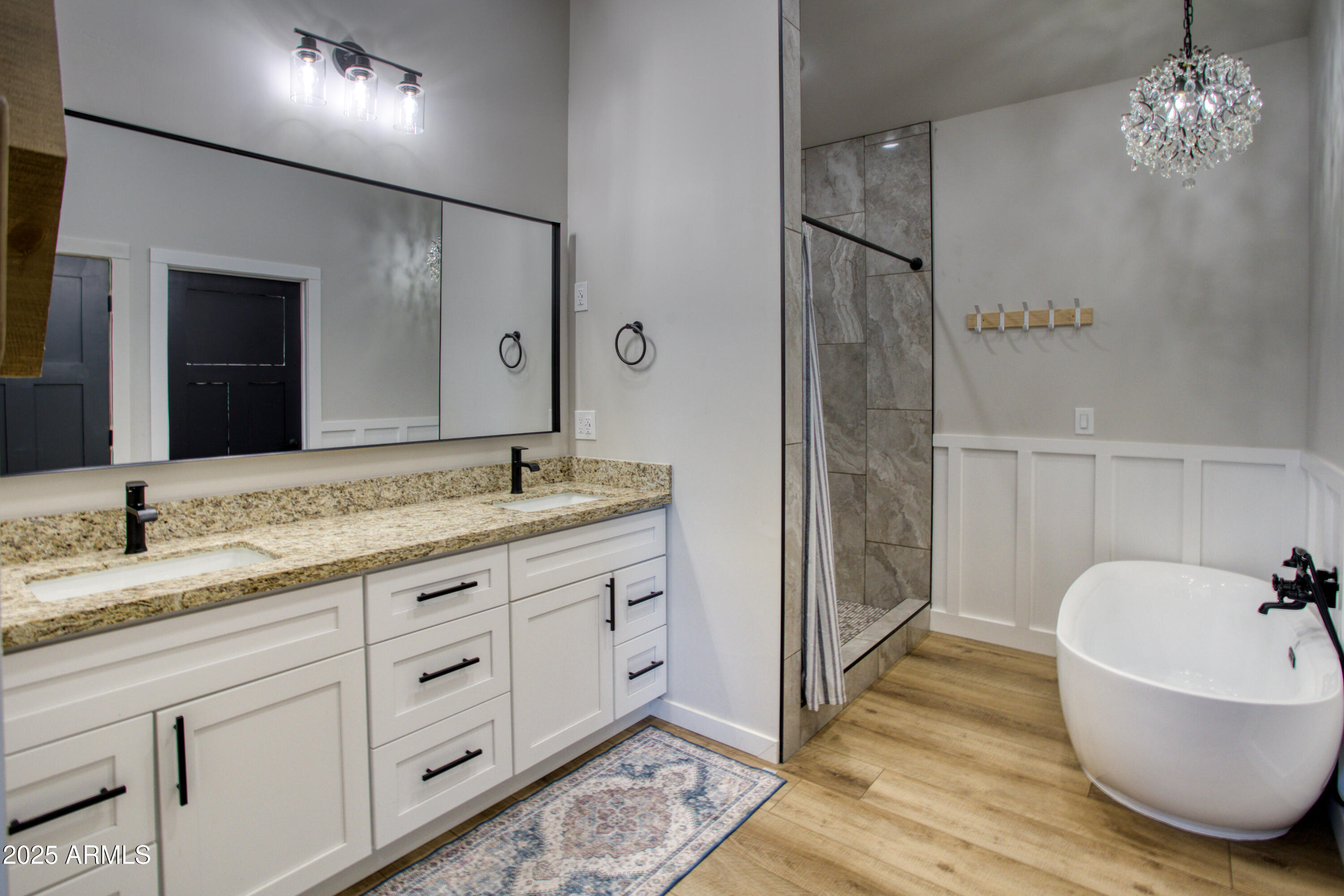 1850 Pinecone Heber, AZ 85928 - Photo 10 of 40 a bath room with a granite countertop sink and a mirror