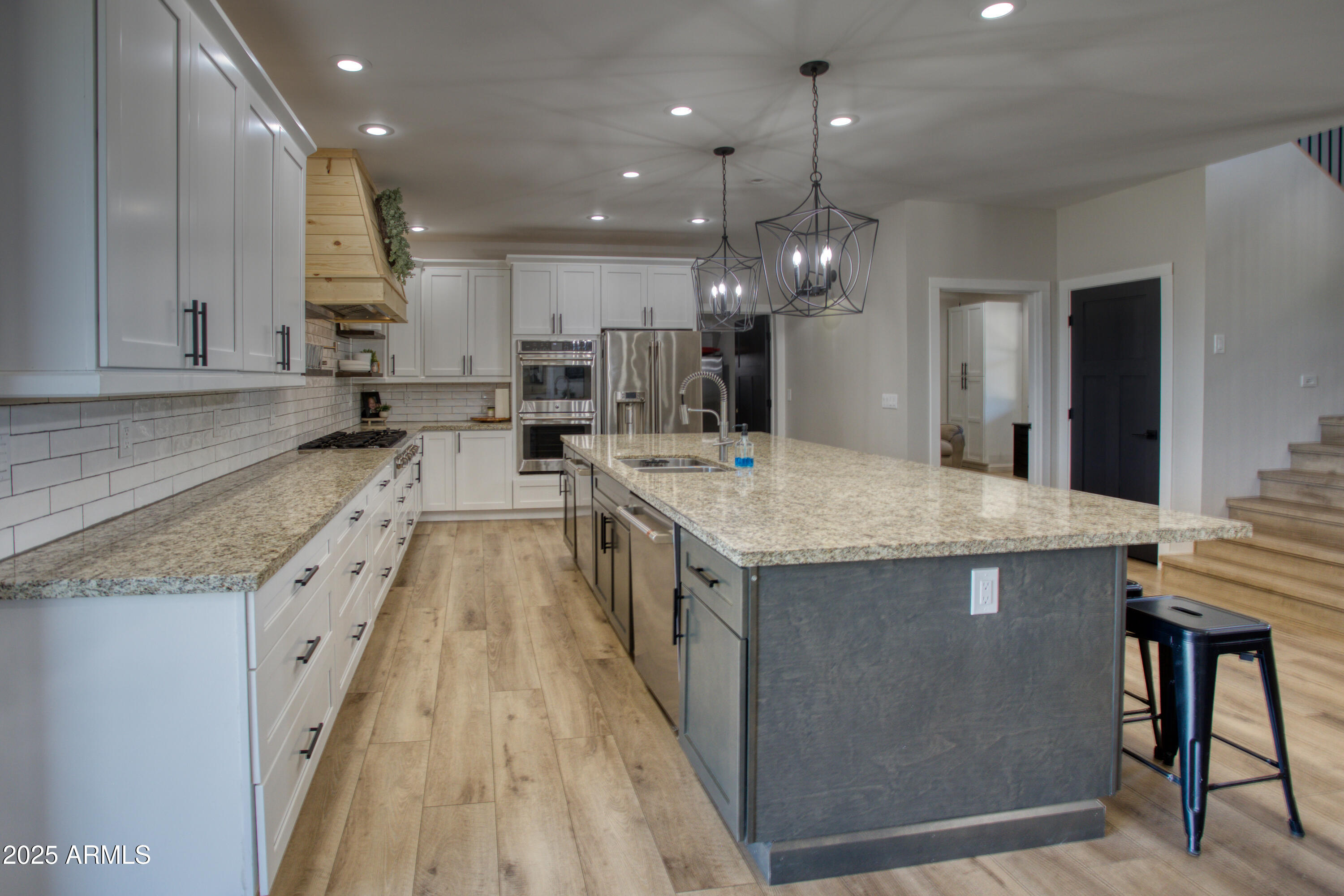 1850 Pinecone Heber, AZ 85928 - Photo 14 of 40 a large kitchen with granite countertop lots of counter space and stainless steel appliances